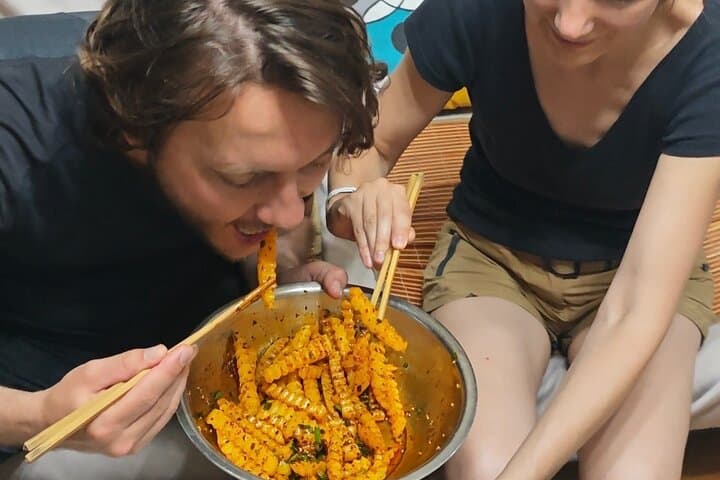 Learn cold noodle and wolf-teeth potato at local home