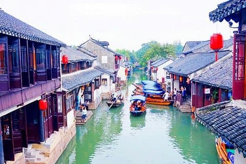 Shanghai privat transport fra Suzhou med stopp-over i Zhouzhuang Water Town