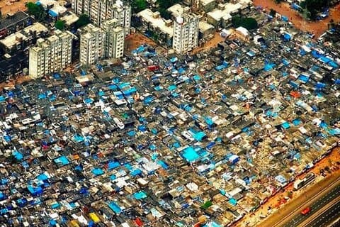Visite privée du plus grand bidonville d'Asie Dharavi avec Guide féminin