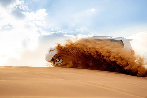 Abu Dhabi Evening Desert Safari with Camel Ride and Dinner