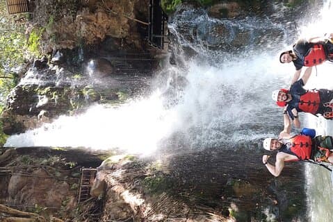 Guachipelin Waterfall Canyoning rappel- rock climbing + lunch