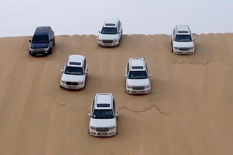 Doha Woestijnsafari delen met Dune Bashing en Sand Boarding