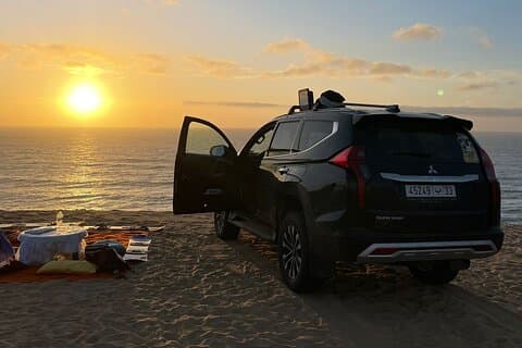 From Agadir or Taghazout: Sunset Sandboarding with Mint Tea