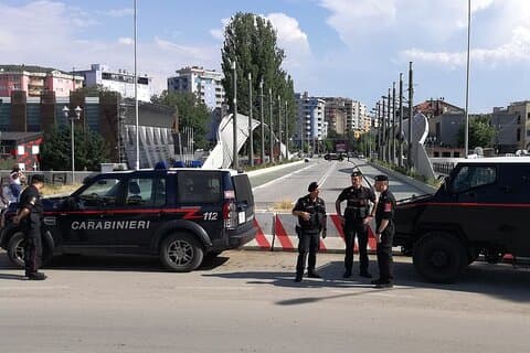 Mitrovica Day Tour from Peja Stories Borders and a Shot of Raki