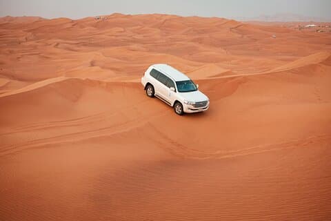 Full Day Desert Camel Ride, Sandboarding Dune Bash and BBQ Meal